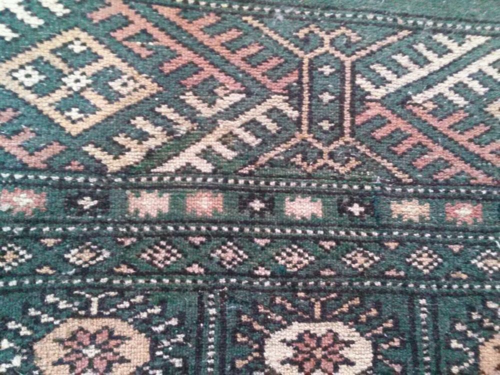 The same Bokhara rug after reweaving