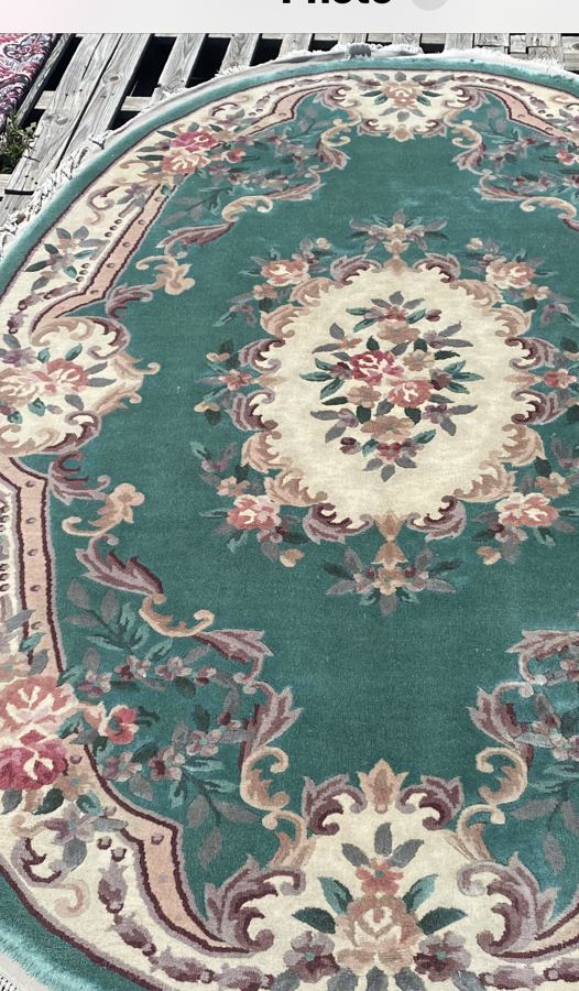 The same oval Chinese rug after shearing
